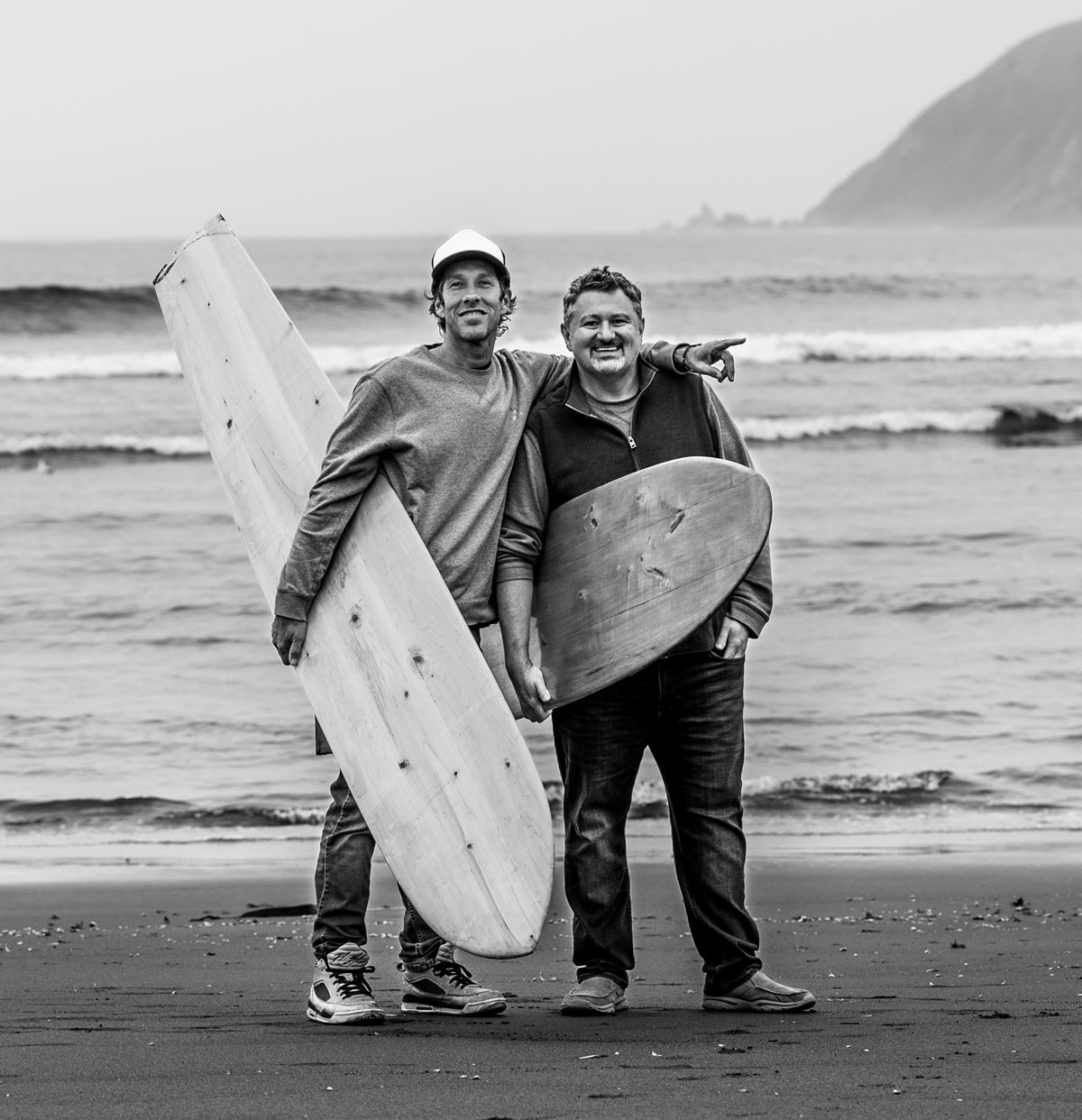 Juan José (Juanjo) Alonso and T. J. Robinson Holding Surf Boards in Chile