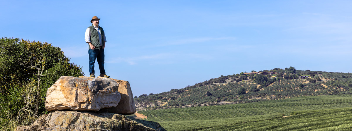T. J. Robinson overlooking Pobeña farm, in Chile