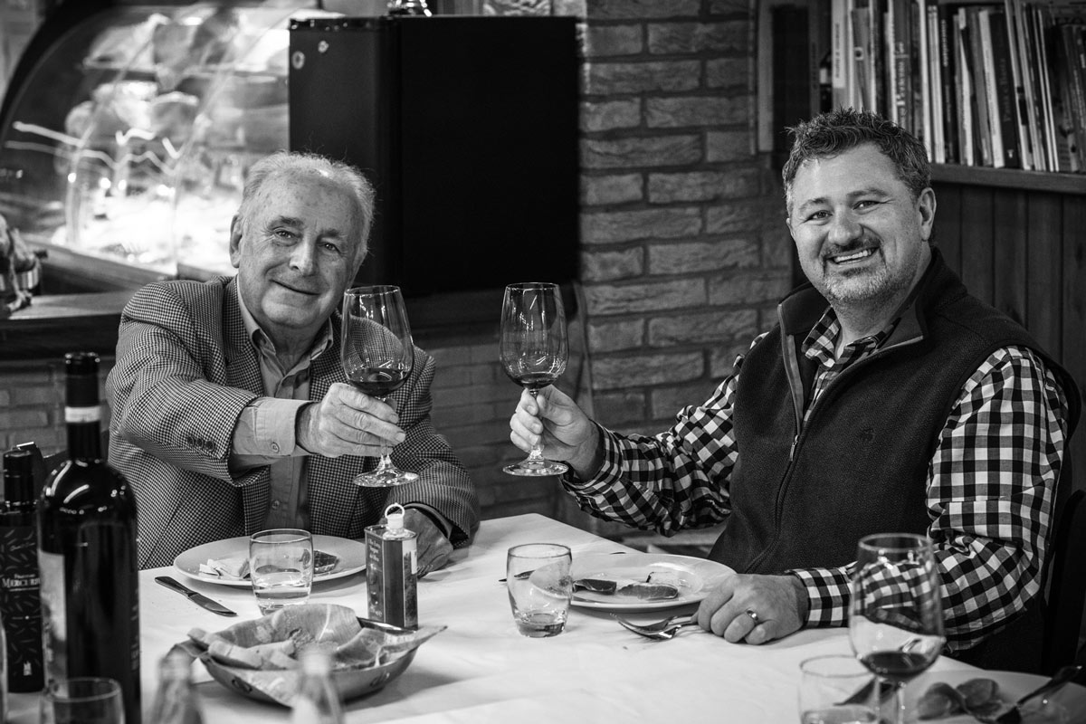 Silvano Ferri, the president of the DOP, and T. J. Robinson at the steakhouse Poggio del Sole.