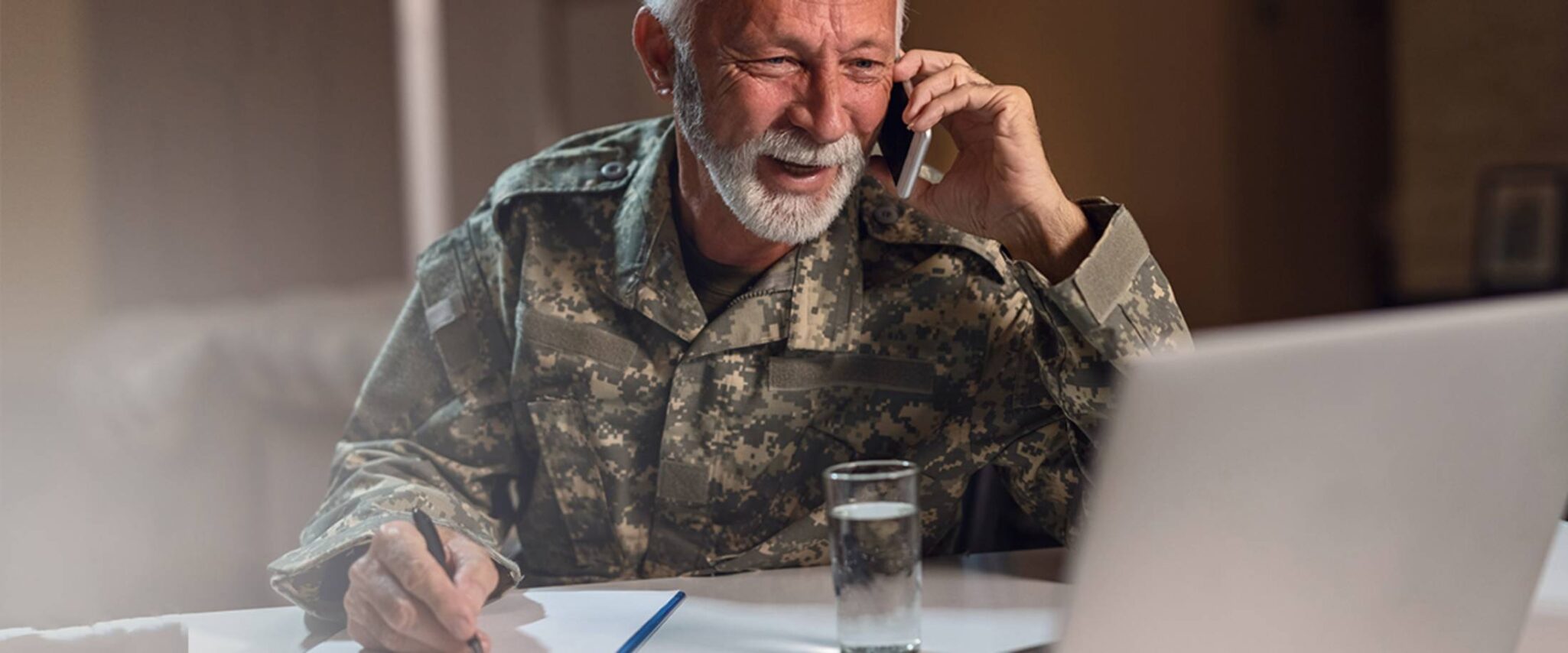 senior veteran talking on a smart phone