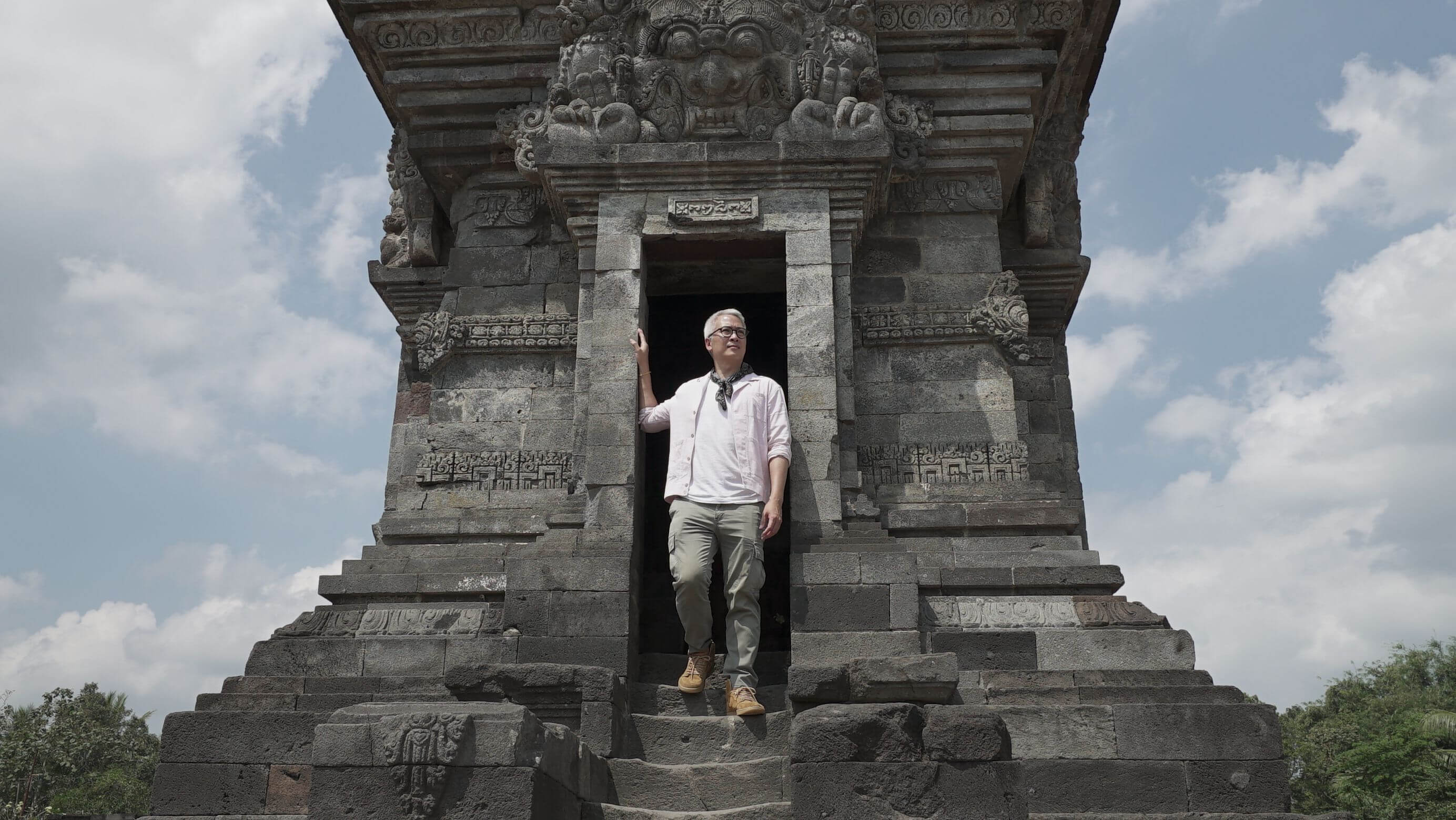 peter lee standing in ancient asian ruins