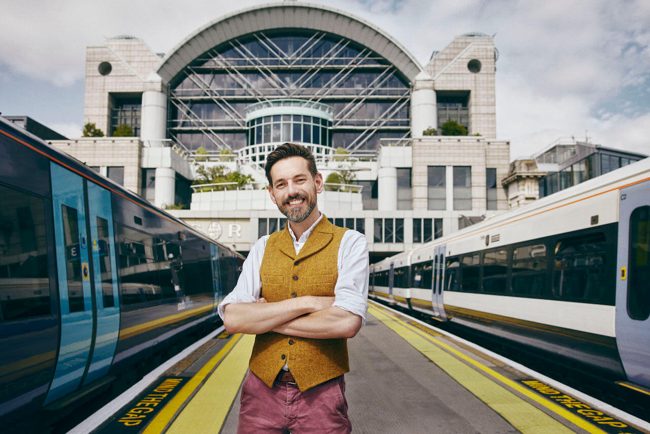 Tim Dunn in front of trains