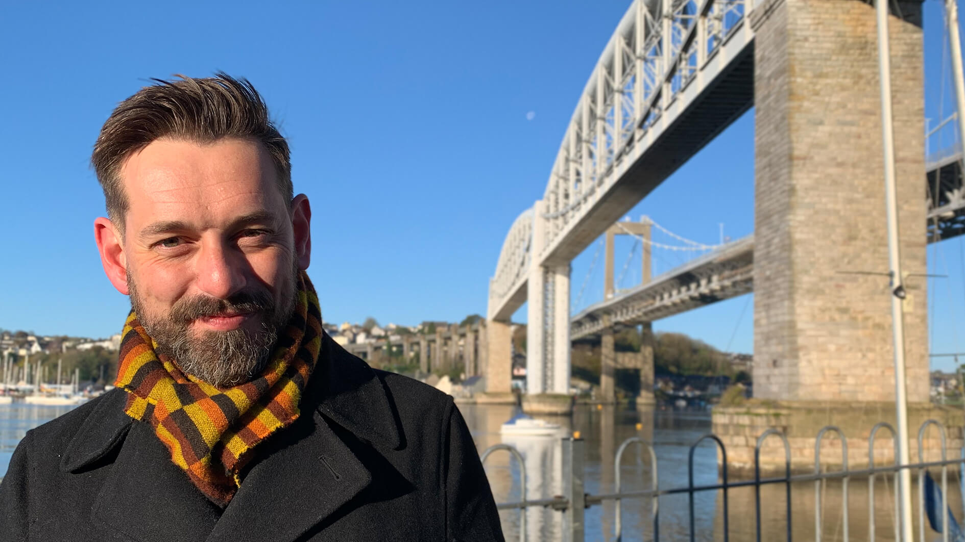 Tim Dunn in front of railway bridge