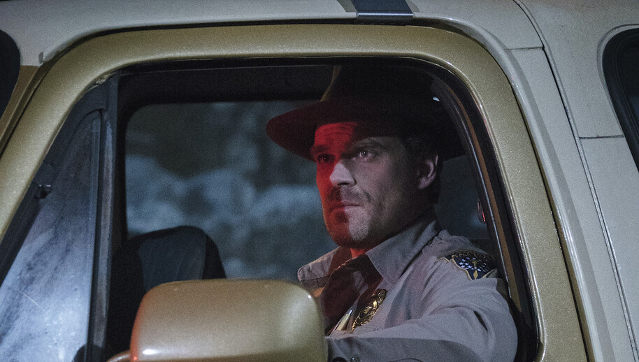 jim hopper in police car