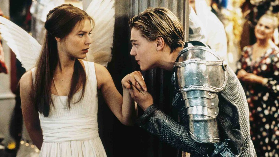 Romeo in armour and Juliet dressed as an angel