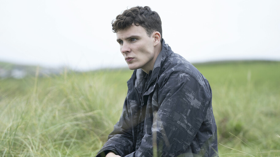 shetland boy in field