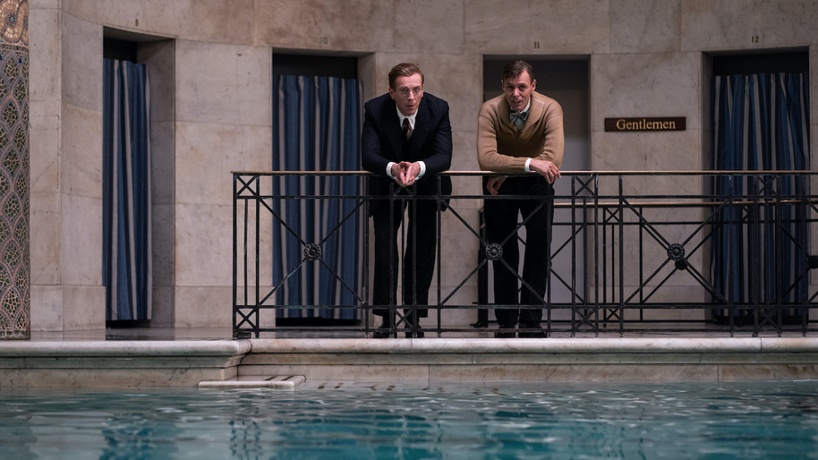 Spies Nicholas Elliot and Ian Fleming talking in a bathhouse in A Spy Among Friends