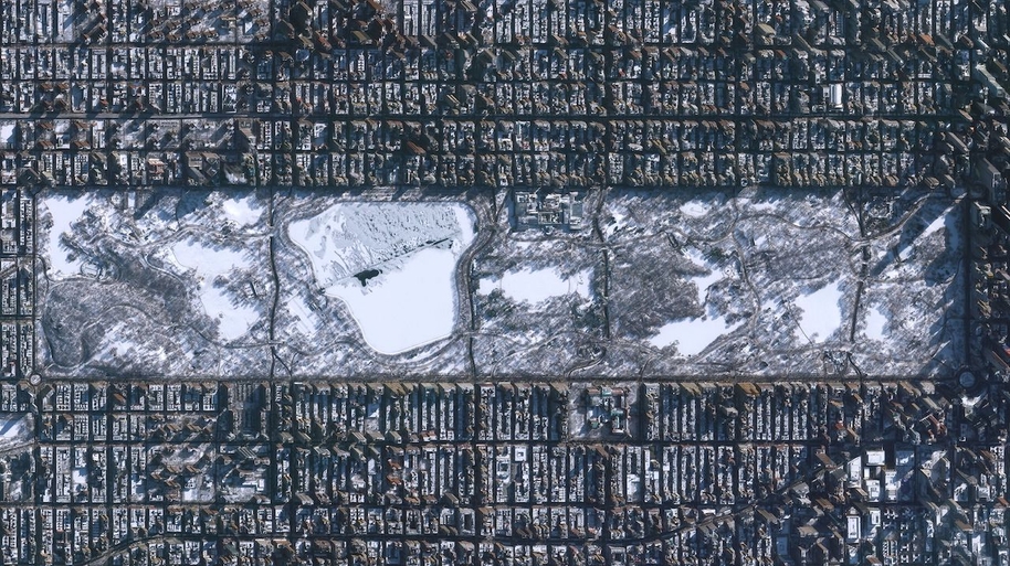 aerial photo of central park, new york covered in snow