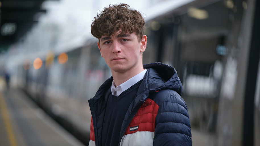 rhys connah as ryan cawood at a train station