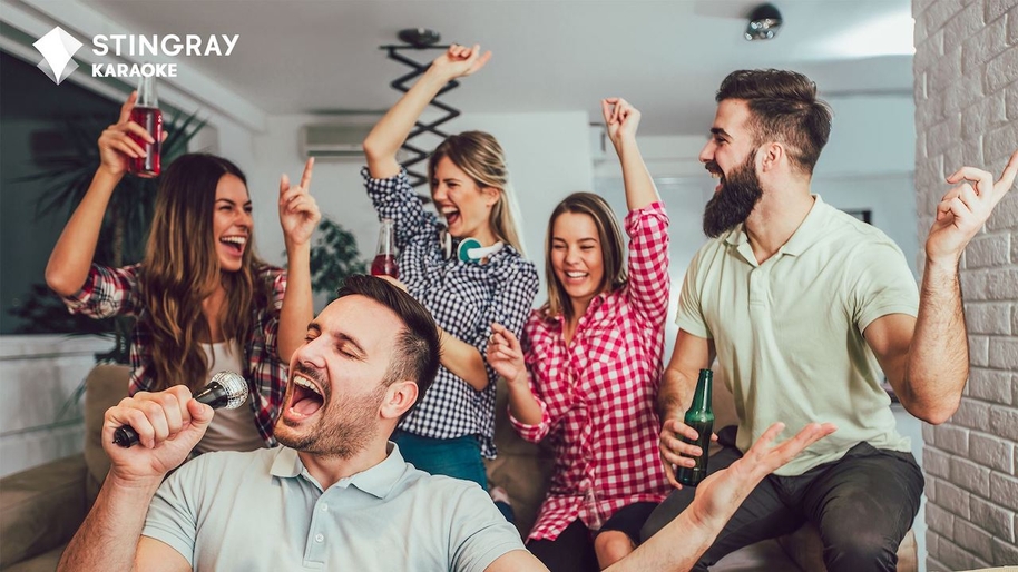 group of friends singing karaoke at home with the stingray karaoke app