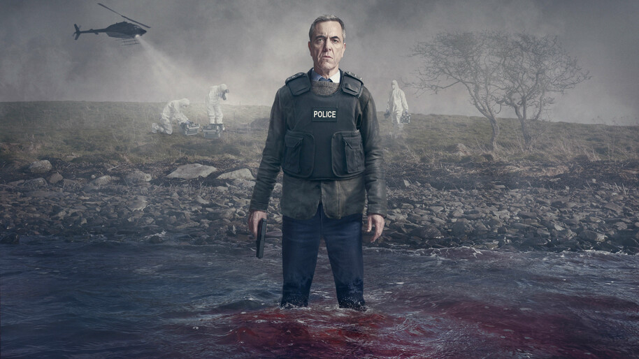 james nesbitt in police uniform holding a gun