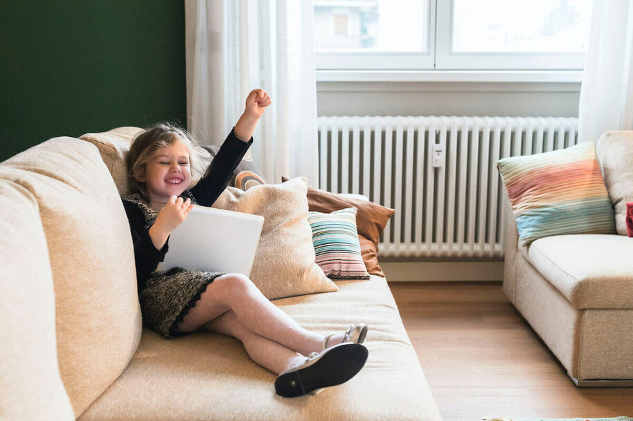 little girl on tablet