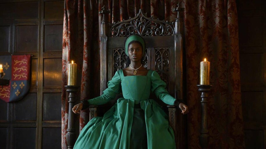 Jodie Turner-Smith as Anne Boleyn in green tudor dress