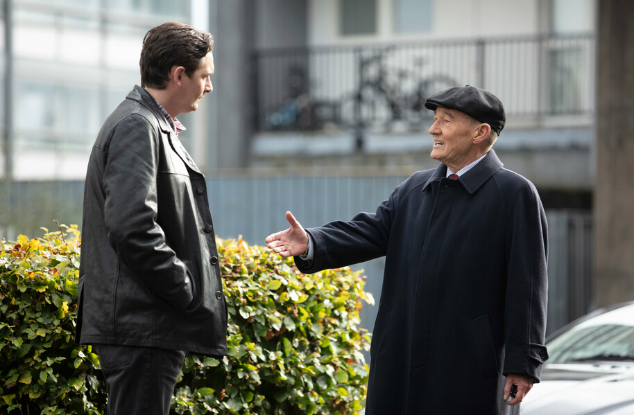 man extending hand for a handshake