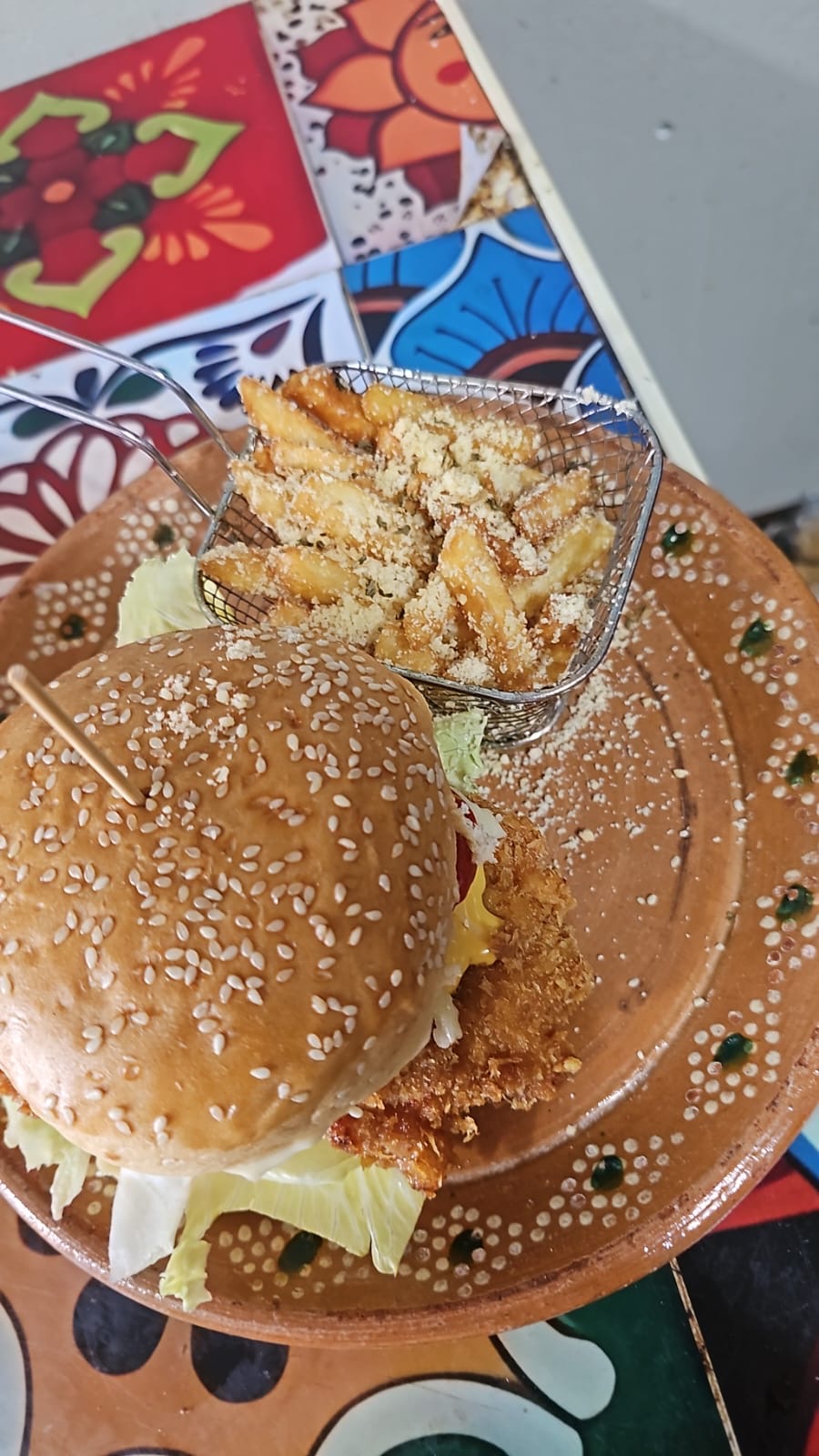 Crispy shrimp burger with parmesan fries