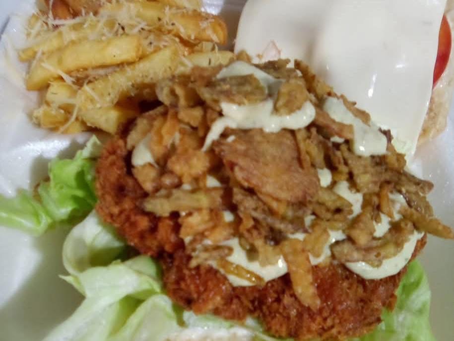 Crispy fish fillet burger served with  fries served with coleslaw
