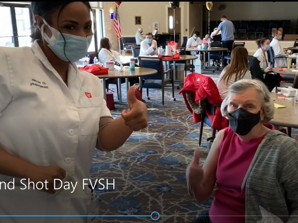 Screenshot of seniors getting vaccine