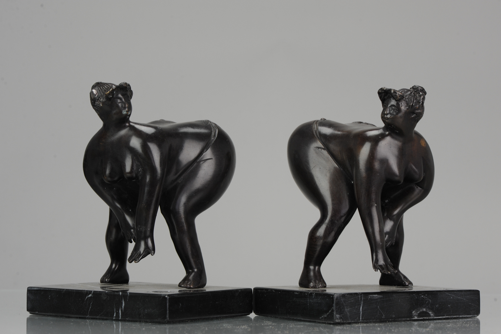 Large Pair of Bronze Bookstand Ladies Signed on the base Michael