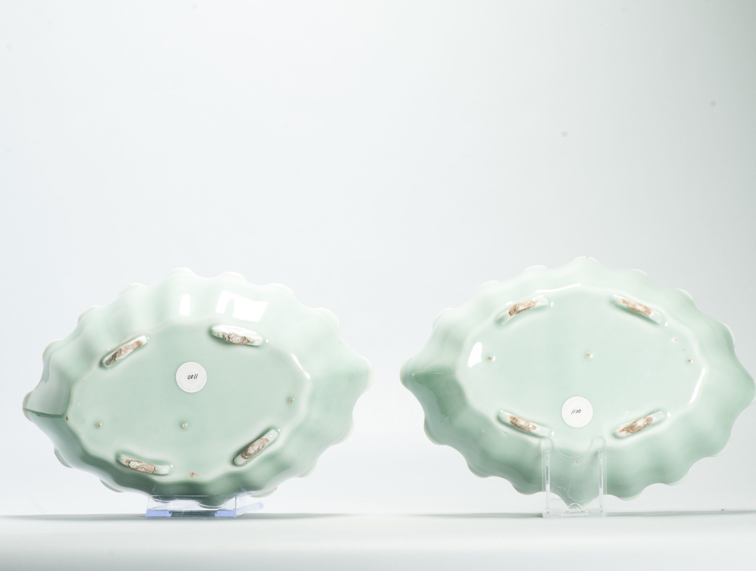 A pair of Antique Chinese celadon-glazed narcissus bowls ruyi-shaped feet