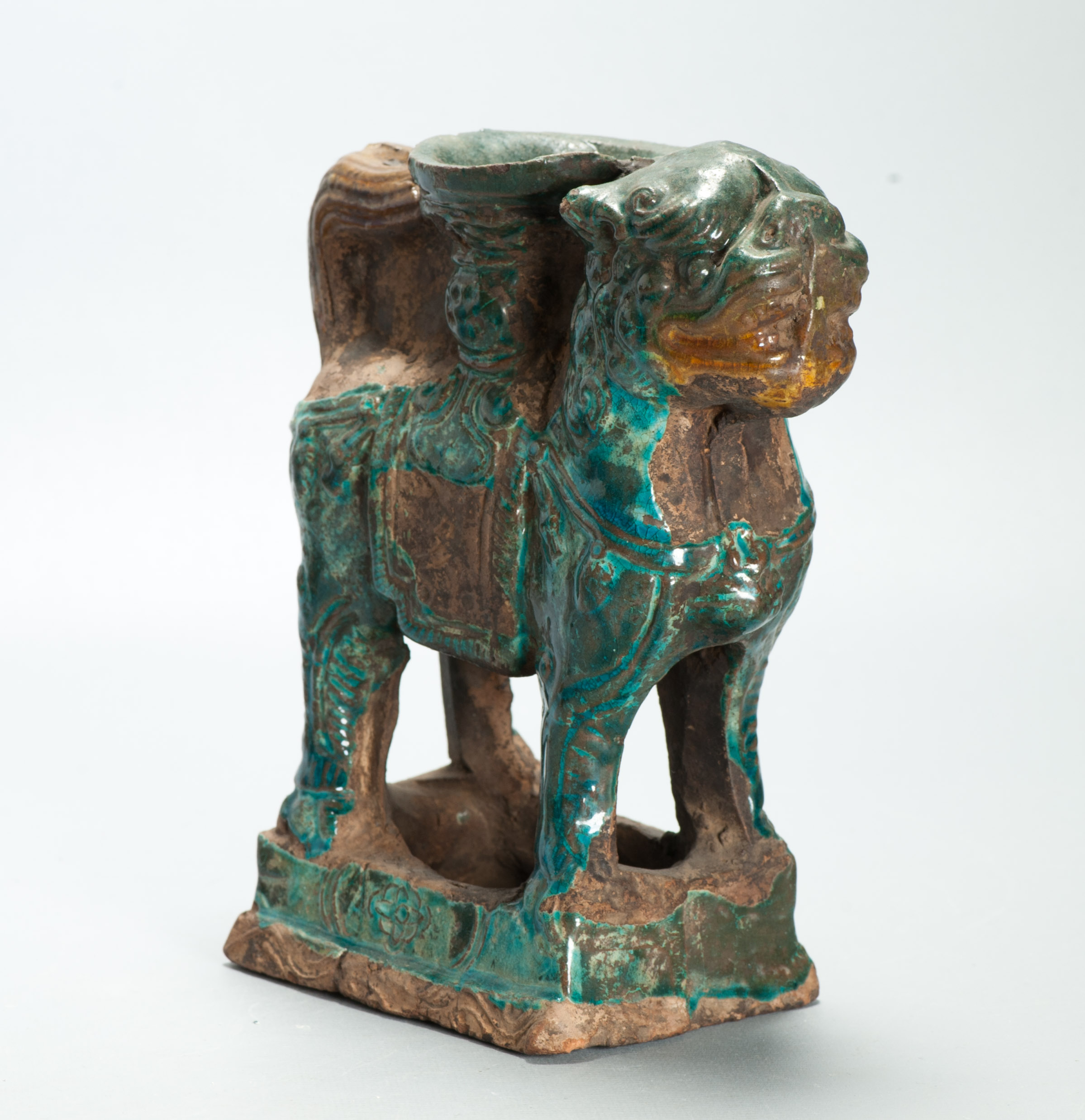 Antique A Ming dynasty Guardian Holder in the form of a qilin-like mythical beast