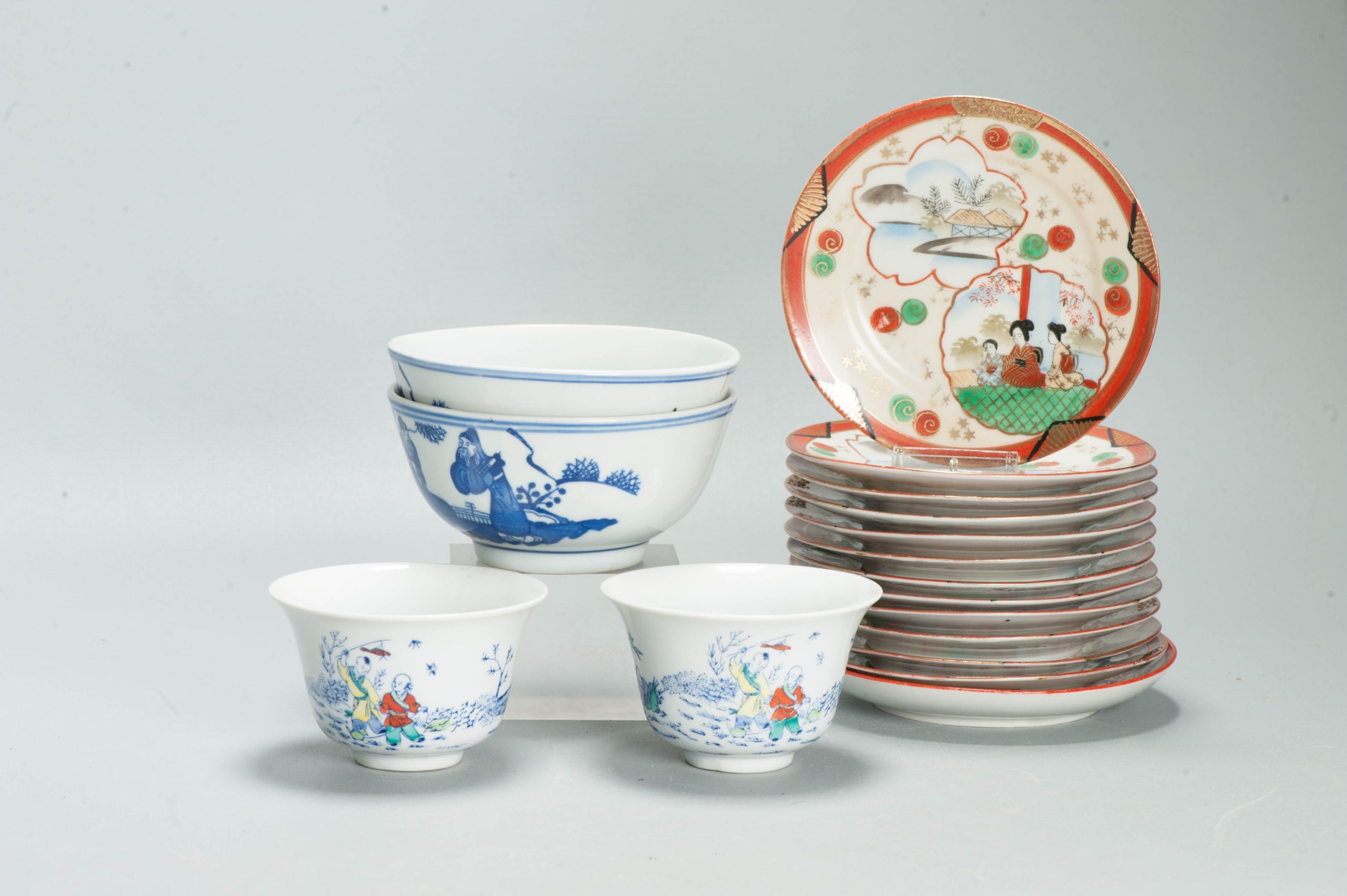4 Perfect Chinese Porcelain cups and 13 Japanese saucers 20th C Japan & China