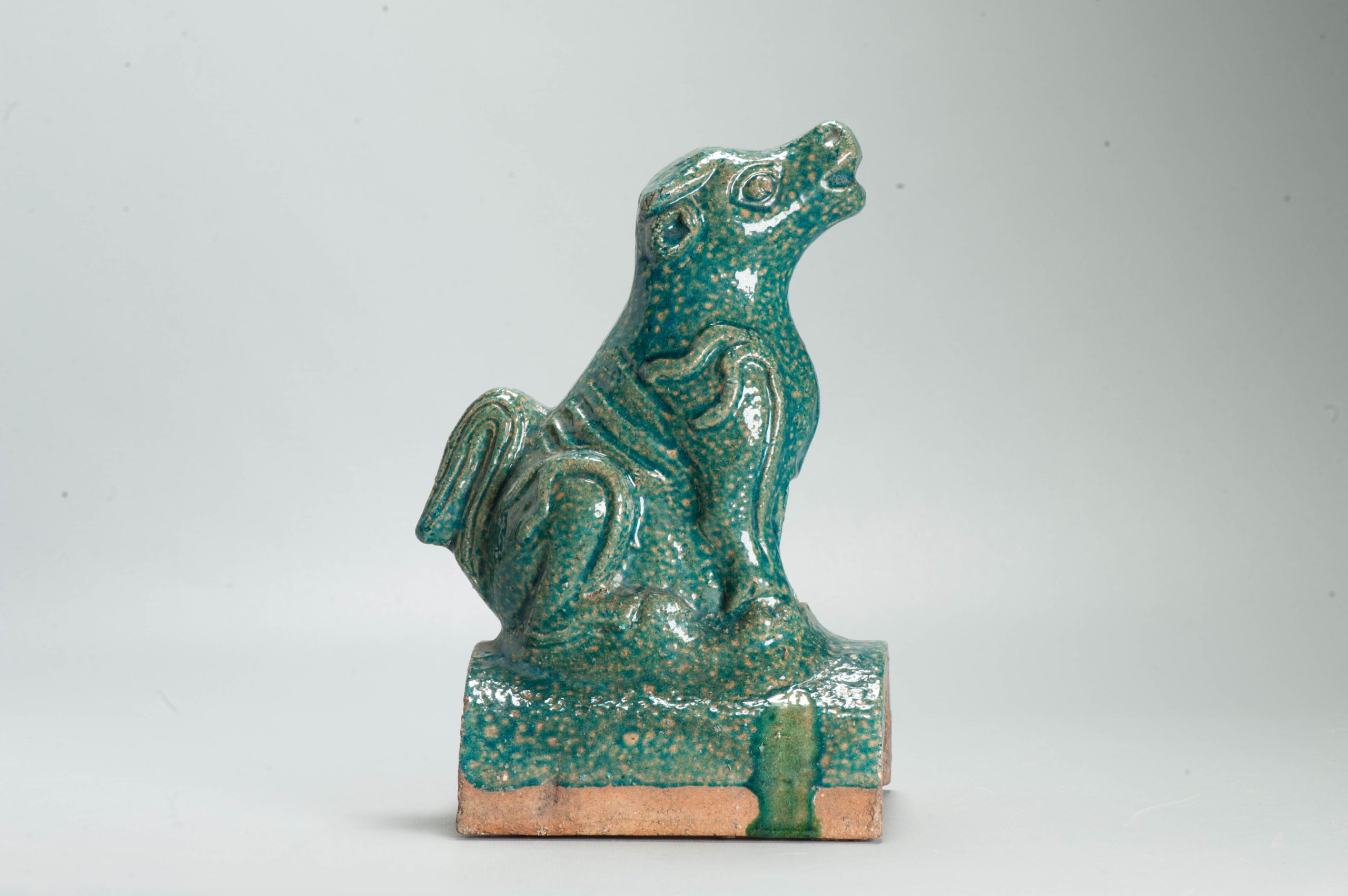 Antique Ming or Qing Earthenware Roof tile Ornament of a Phoenix Fenghuang