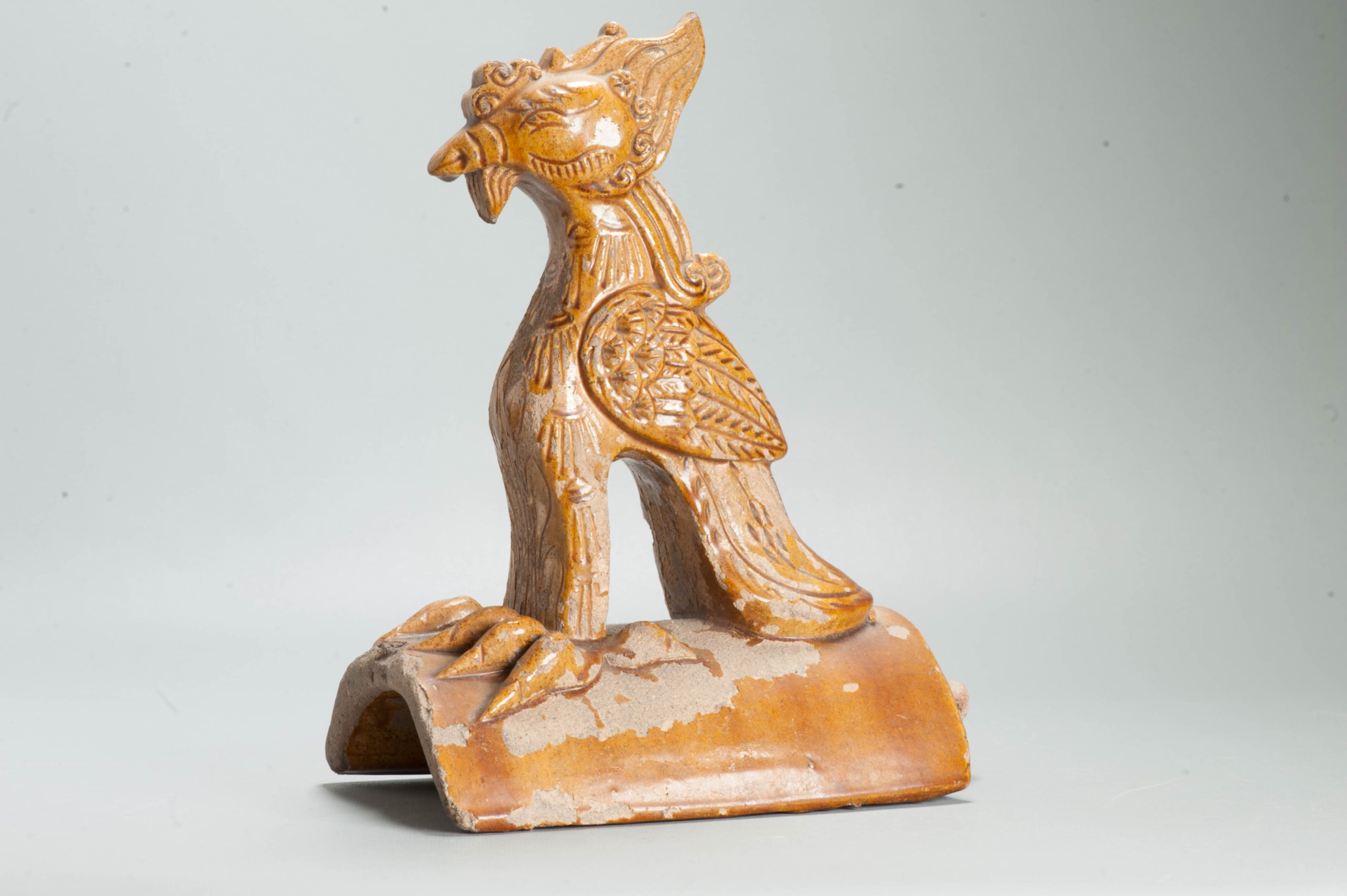 Antique Ming or Qing Earthenware Roof tile Ornament of a Phoenix Fenghuang