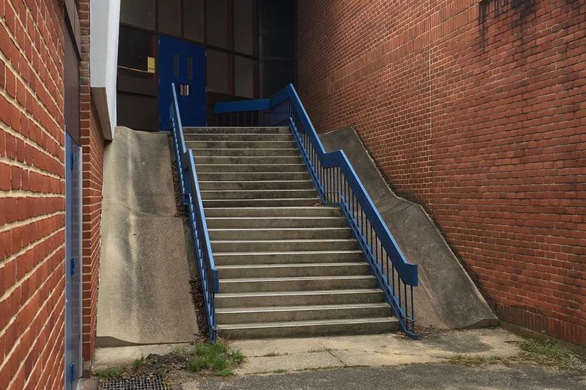 Image for skate spot Old Mill High School Over Rail Into Double Bank