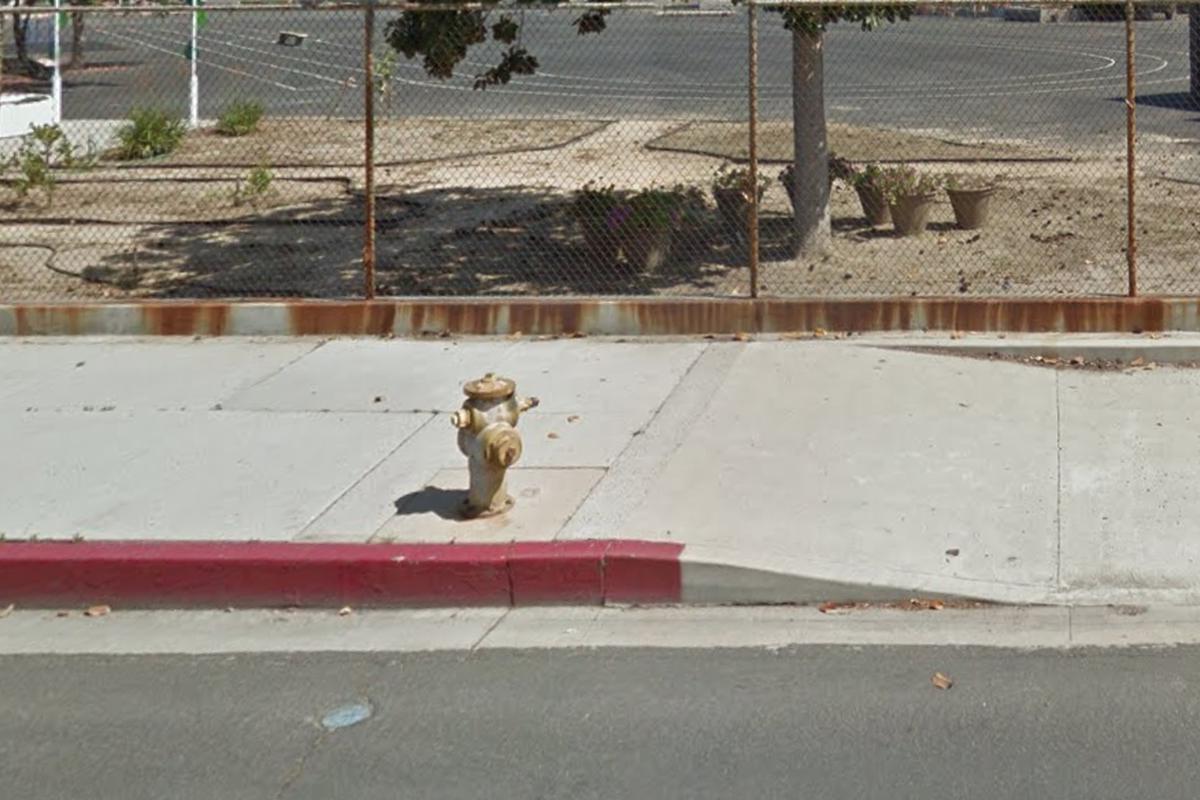 Image for skate spot Bump over hydrant to curb