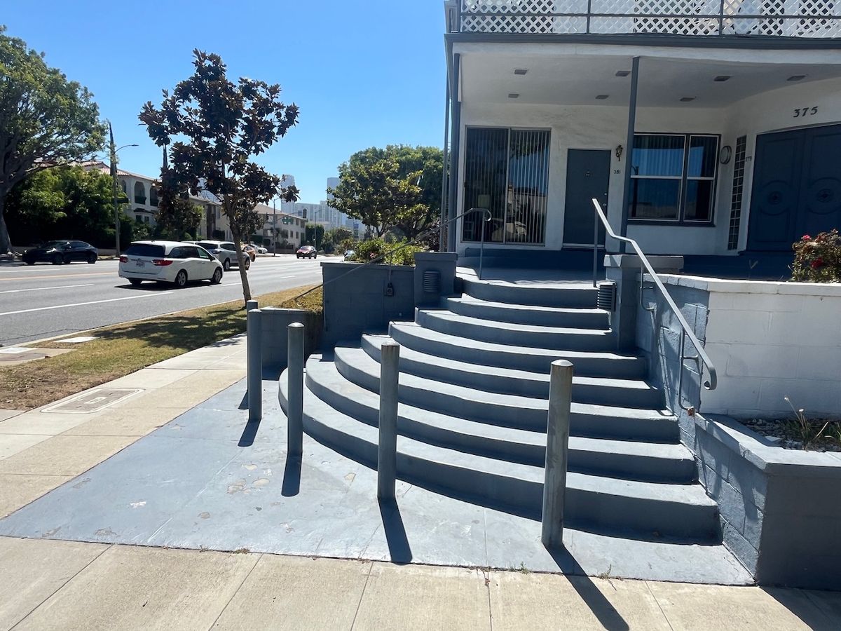 Image for skate spot W Olympic Blvd - 8 Stair Pole Gap