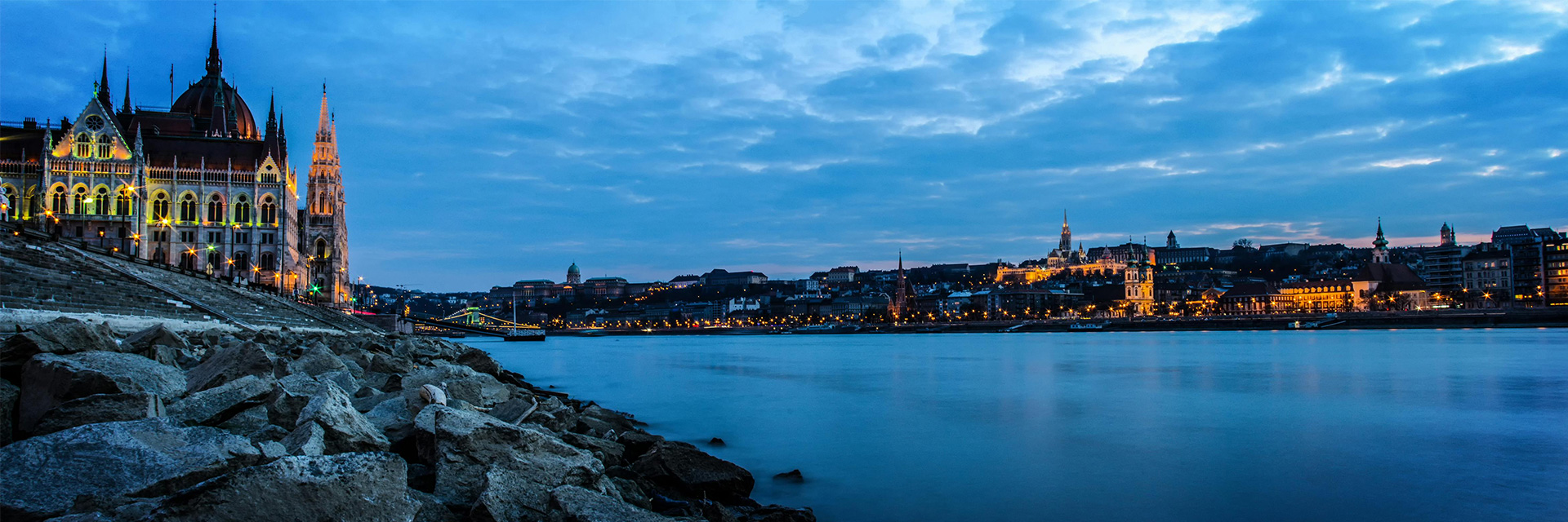 Luxury Villa in Hungary with terrace, soft light and serene surroundings by quiet lake or woodland.