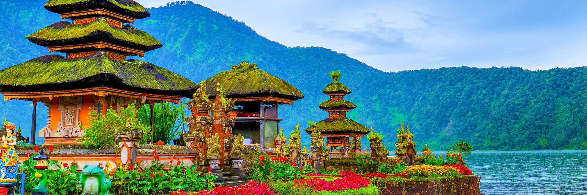 Coastal villa rental in Indonesia with ocean-view terrace, palm trees and sunset serenity.