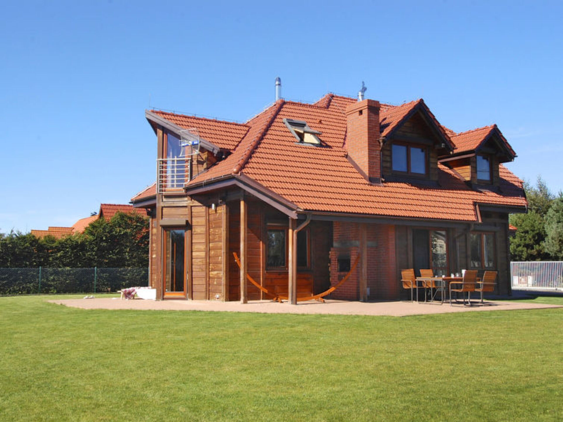Modern luxury villa in Poland with sauna, quiet meadow views and soft winter light.