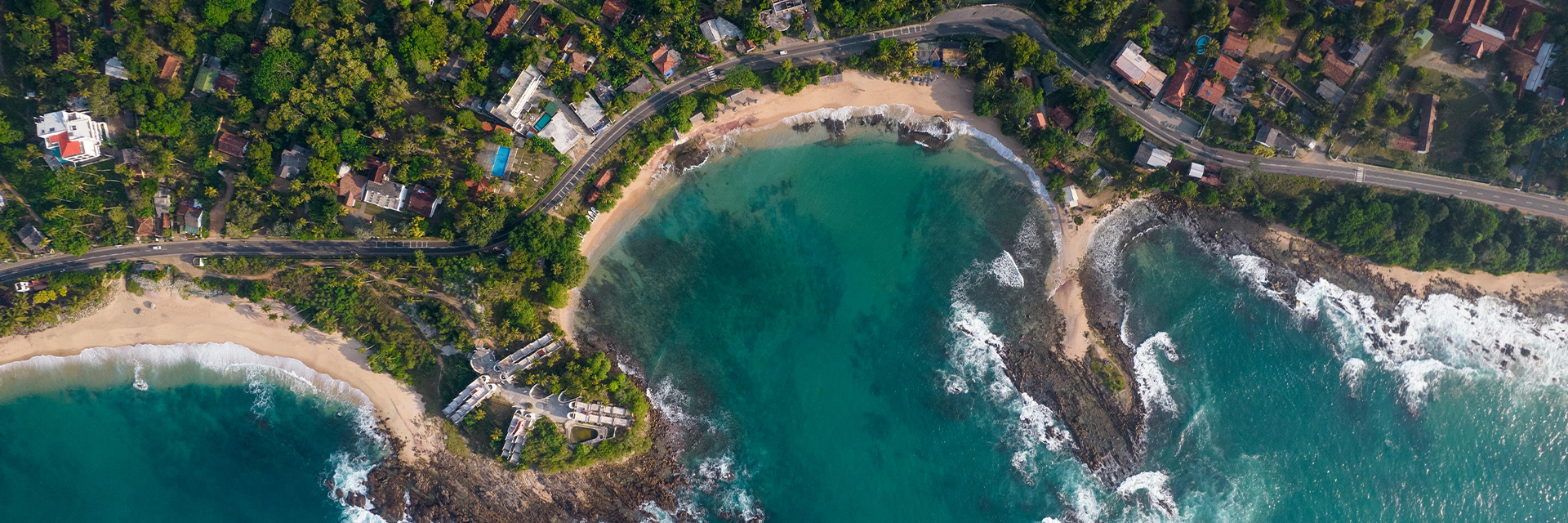 Vacation villa in Sri Lanka surrounded by tea fields, palm wind and warm coastal light.