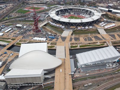 Aerial view of Queen Elizabeth Olympic Park showing the stadium, ArcelorMittal Orbit, Aquatics Centre and waterways