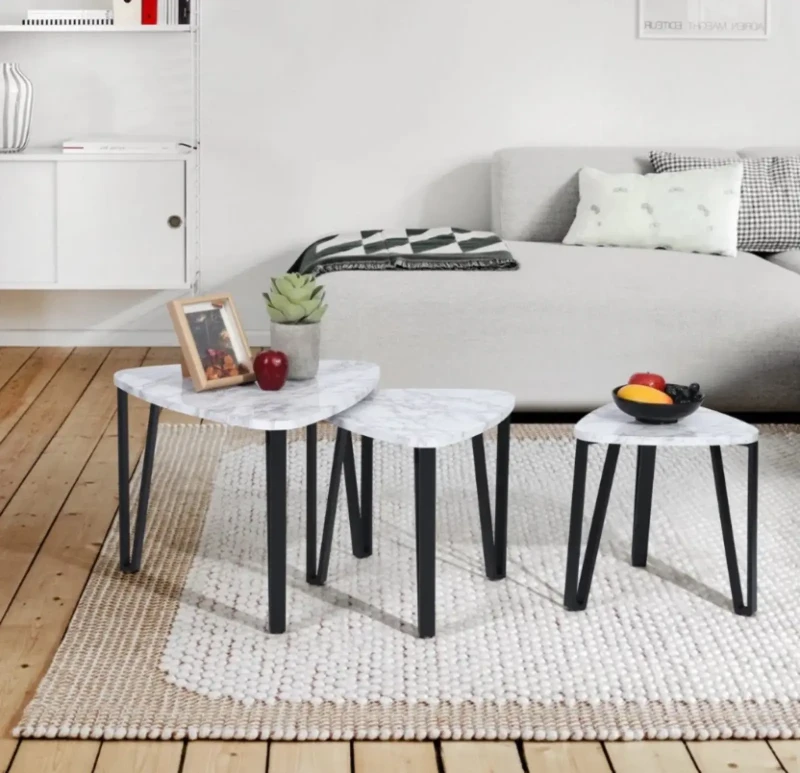A set of side tables - triangular shape with metal legs