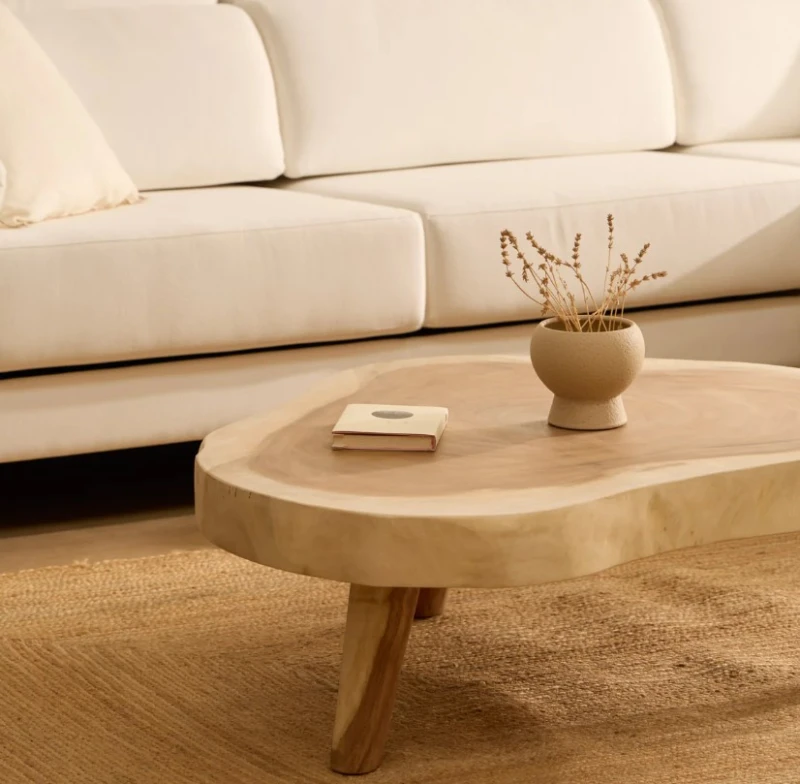 A coffee table made of natural wood
