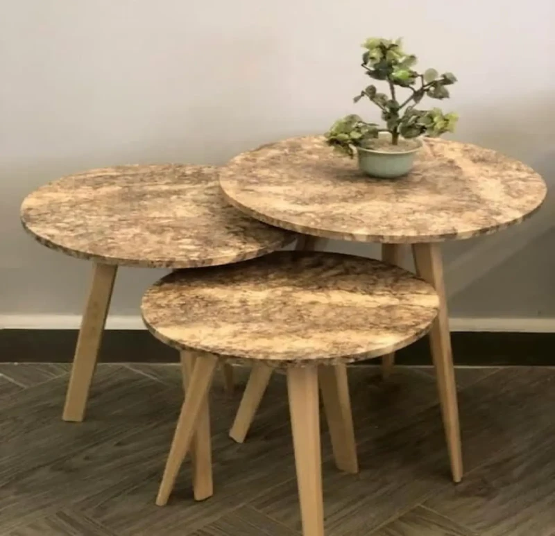 A set of metal-wood leg tables with a marble effect