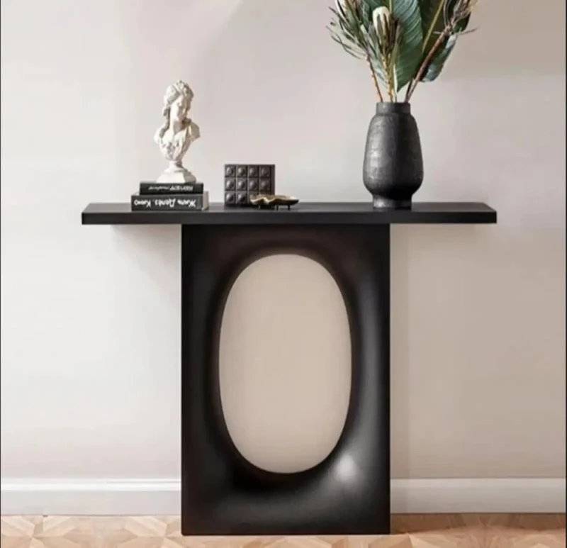 Black wooden console with a distinctive design