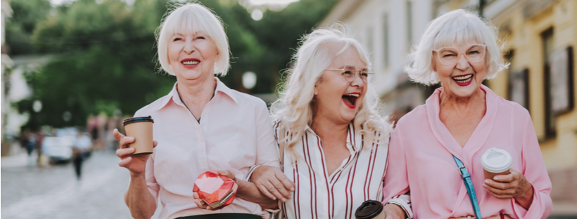 shutterstock_1230916246 Three senior women walk and talk through downtown Greenville