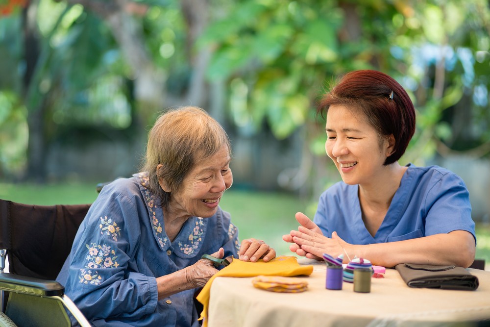 shutterstock_1732639793 Senior woman doing occupational therapy with nurse