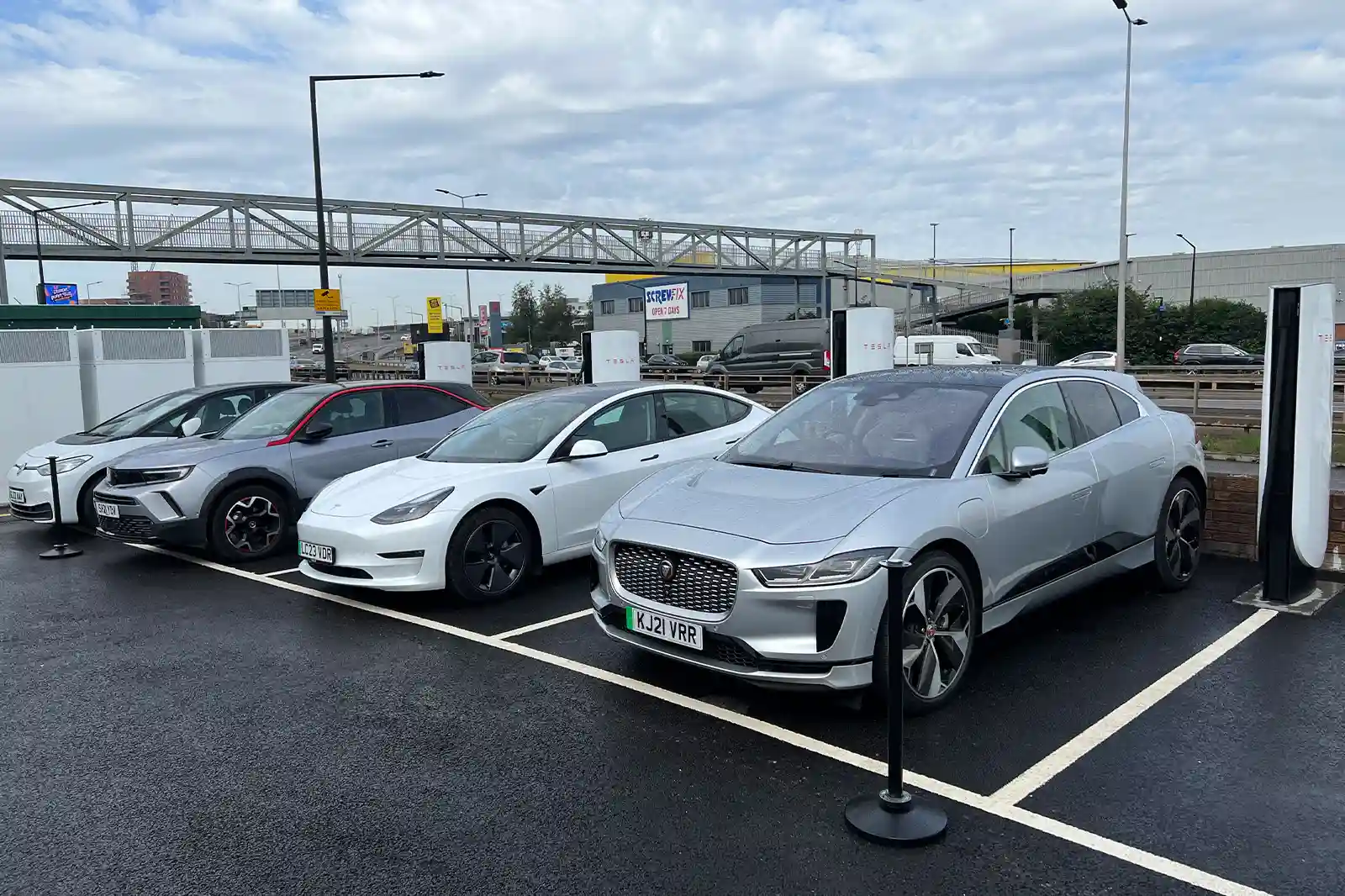 An engineering and financial evaluation of utilizing the open Tesla Supercharger network for non-Tesla electric vehicles, deconstructing V2 to V4 hardware variations, cable geometry constraints, and subscription arbitrage economics.