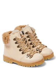 Schnürstiefel aus Leder und Shearling