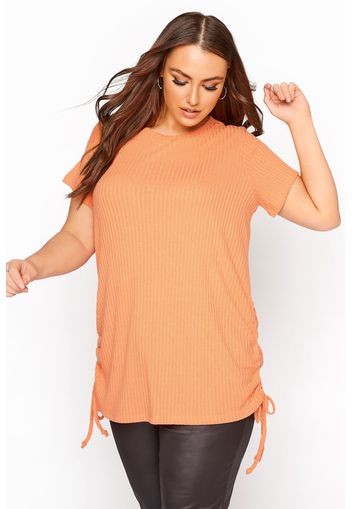 Große größen orangefarbenes geripptes tshirt mit gerafftem saum 50-52