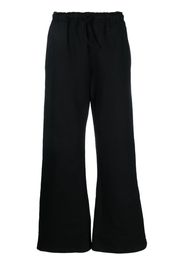 032c logo-print flared track pants - Schwarz