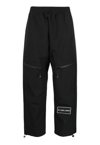 44 LABEL GROUP logo-patch straight-leg trousers - Schwarz