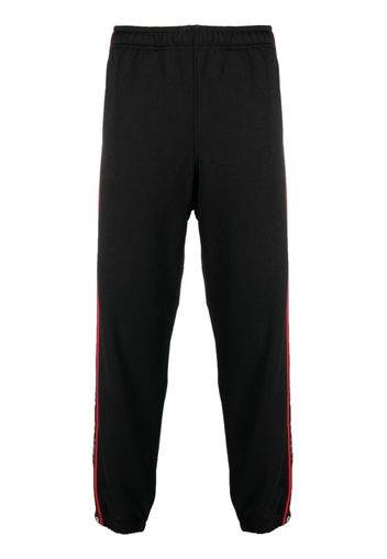 44 LABEL GROUP logo-stripes cotton track pants - Schwarz