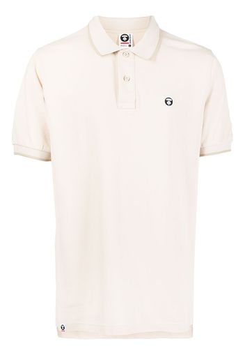 AAPE BY *A BATHING APE® Poloshirt mit Ape Head-Stickerei - Nude