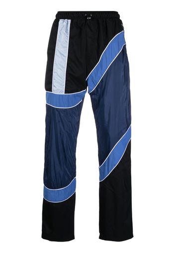 Ahluwalia colour-block stripe-detail trousers - Blau