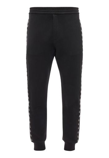 Alexander McQueen eyelet-detail track pants - Schwarz